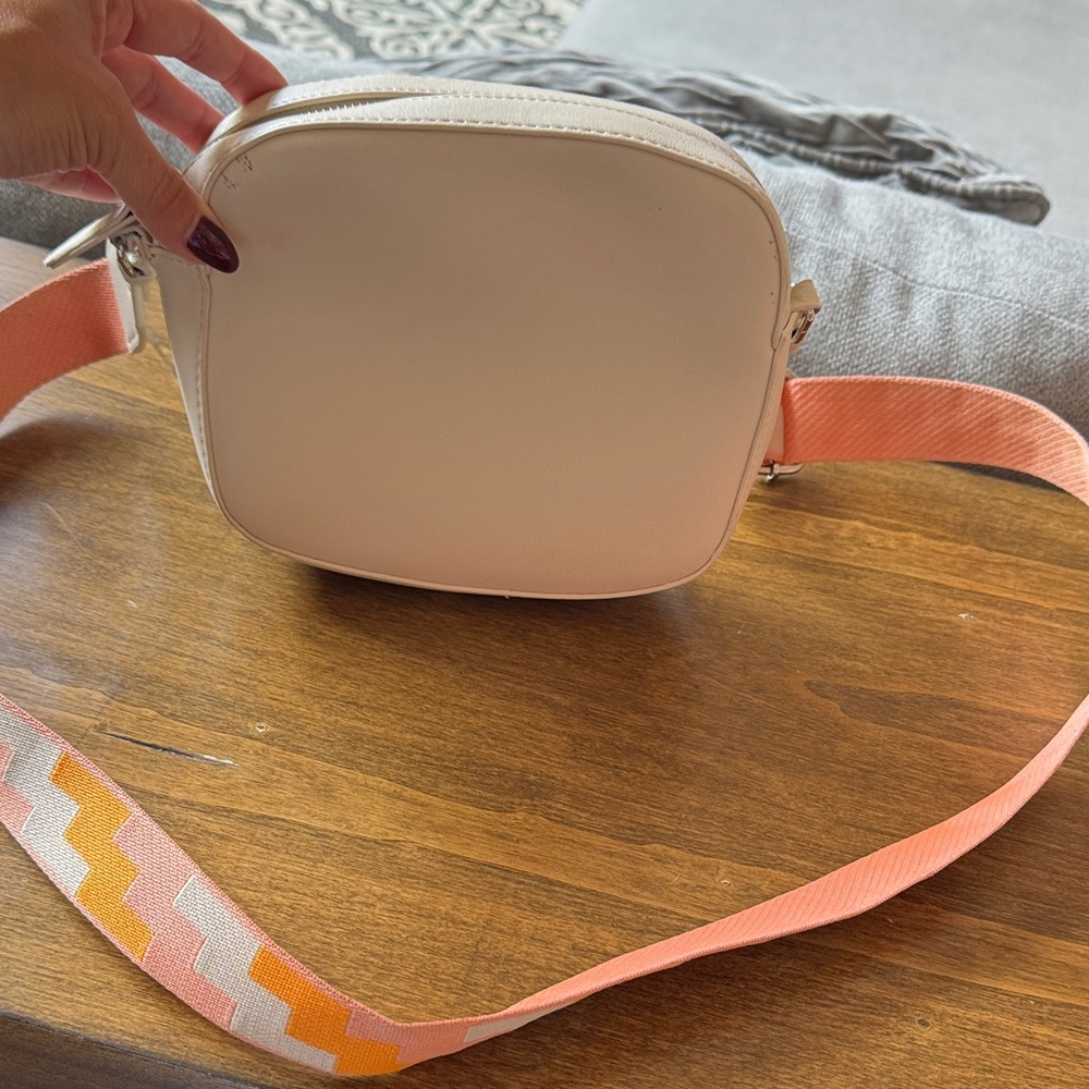 Urban Outfitters Stylish Cream Crossbody Bag with Pink multi Strap